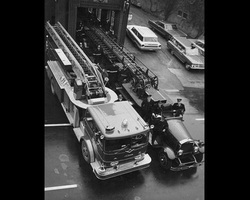 The LaFrance/Mercury Quint prepares to go into action at the Herald Press fire on Pitt St. W. in June, 1974