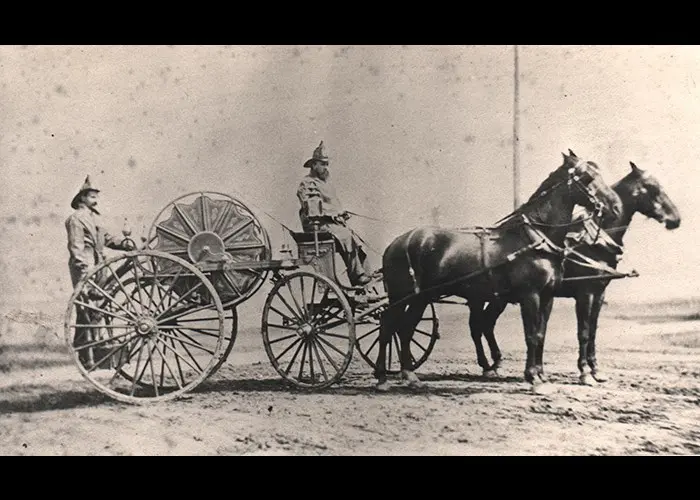 Four-wheel hose reel with two-horse hitch, 1880